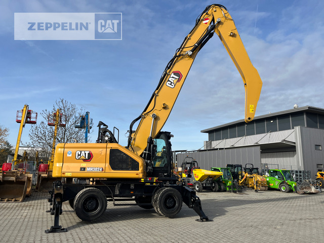 Cat MH3024-07A - Hulladék kotró: 3 kép. Cat MH3024-07A - Hulladék kotró: 3 kép.