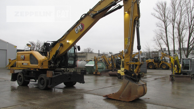 Cat MH3024-07A - Hulladék kotró: 1 kép. Cat MH3024-07A - Hulladék kotró: 1 kép.