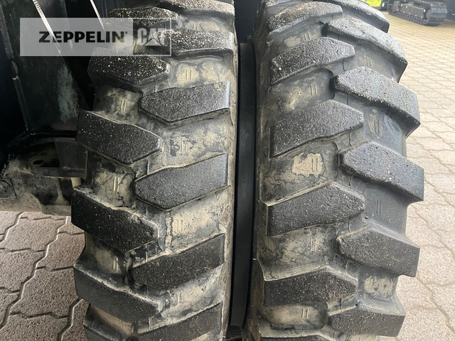 Hulladék kotró Cat MH3024: 16 kép.