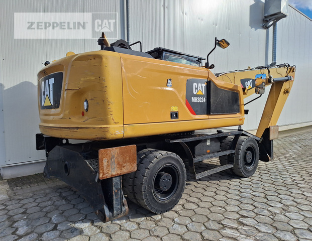 Cat MH3024 - Hulladék kotró: 4 kép. Cat MH3024 - Hulladék kotró: 4 kép.