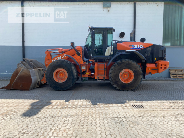 Hitachi ZW310-6 - Gumikerekes homlokrakodó: 1 kép. Hitachi ZW310-6 - Gumikerekes homlokrakodó: 1 kép.
