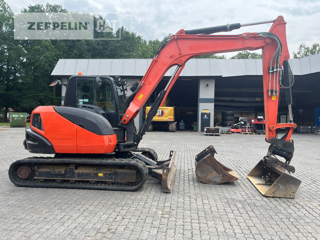 Kubota KX080-4 - Minikotró: 4 kép. Kubota KX080-4 - Minikotró: 4 kép.