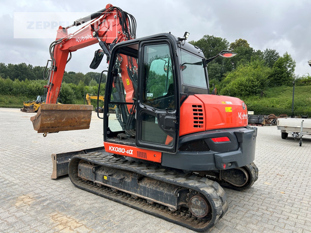 Kubota KX080-4 - Minikotró: 2 kép. Kubota KX080-4 - Minikotró: 2 kép.