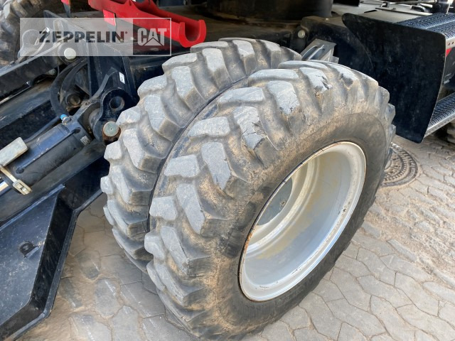 Gumikerekes kotró Zeppelin ZM110: 16 kép.