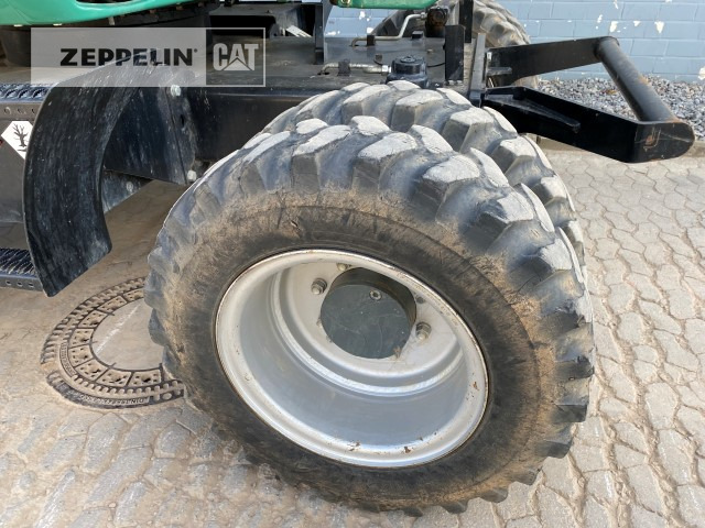 Gumikerekes kotró Zeppelin ZM110: 17 kép.