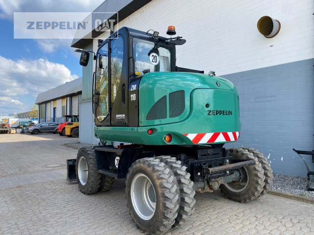 Gumikerekes kotró Zeppelin ZM110: 7 kép.