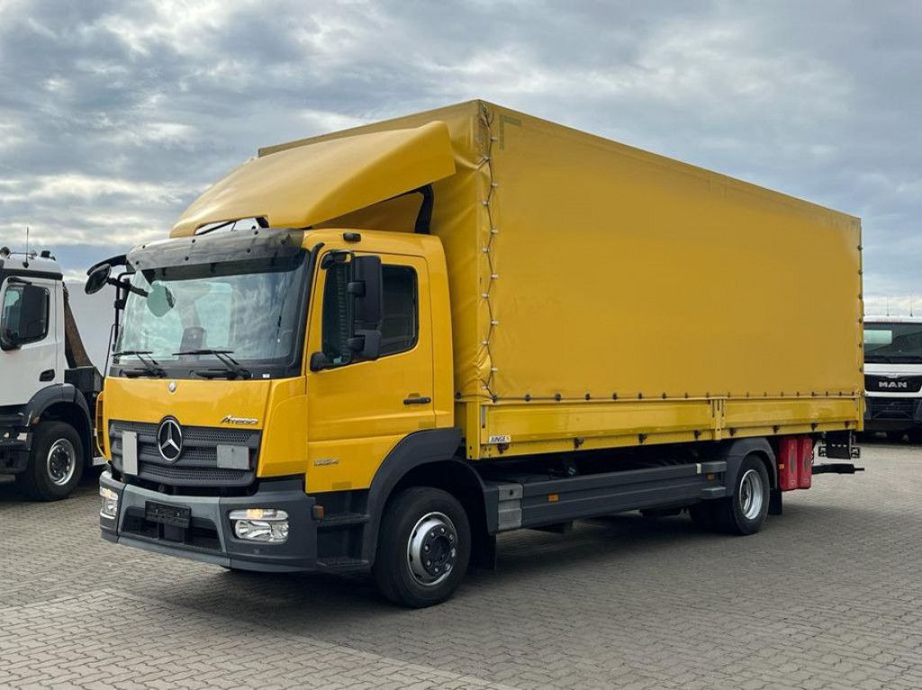 Mercedes-Benz Atego 1224 L Pritsche LBW - Ponyvás teherautó: 1 kép. Mercedes-Benz Atego 1224 L Pritsche LBW - Ponyvás teherautó: 1 kép.