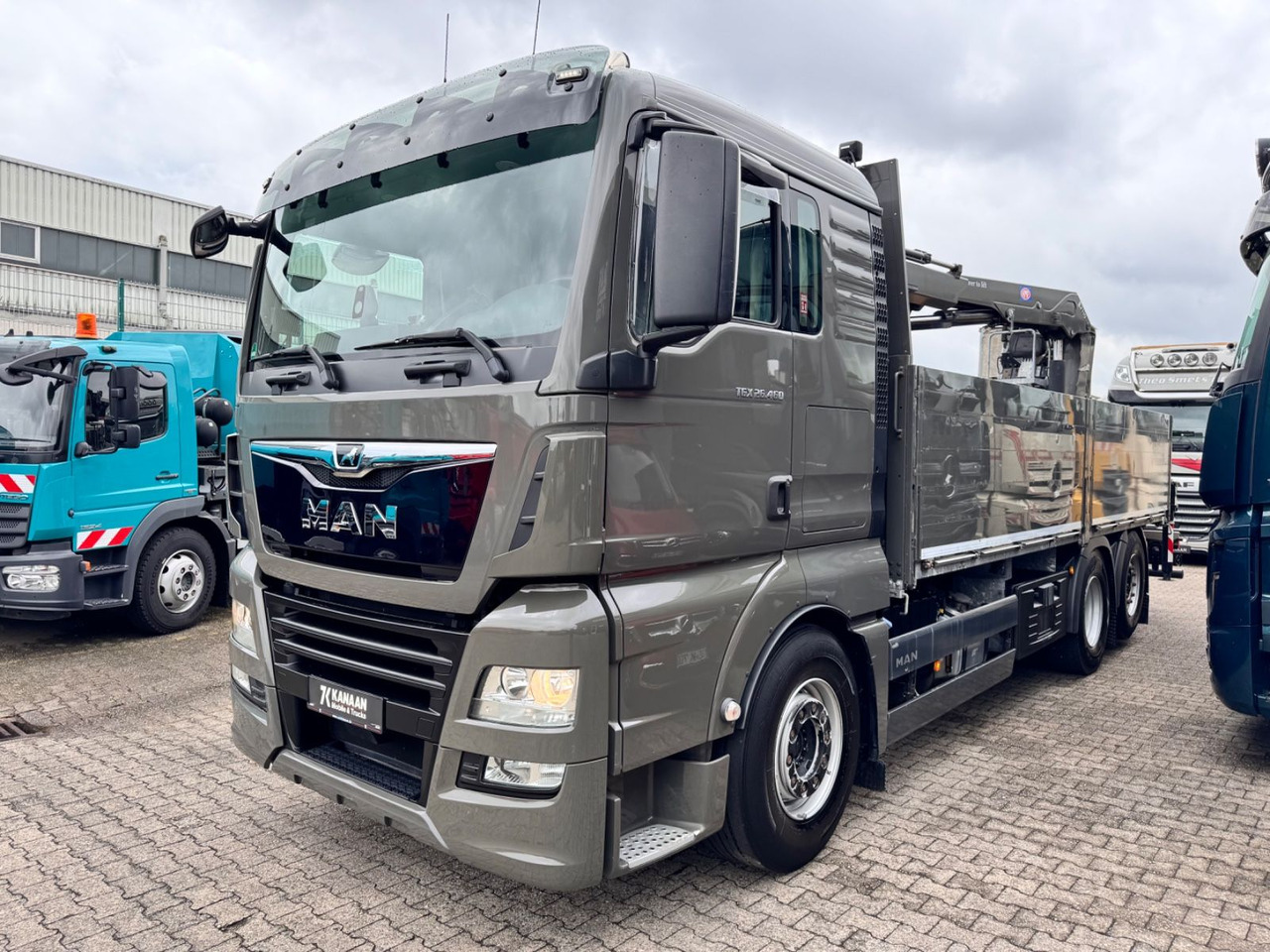 MAN 26.460 TGX Baustoffkran HMF 2110-L3 - Darus autó: 2 kép. MAN 26.460 TGX Baustoffkran HMF 2110-L3 - Darus autó: 2 kép.