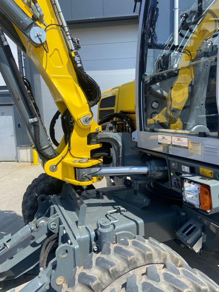 Wacker Neuson EW100 (7057) - Gumikerekes kotró: 4 kép. Wacker Neuson EW100 (7057) - Gumikerekes kotró: 4 kép.